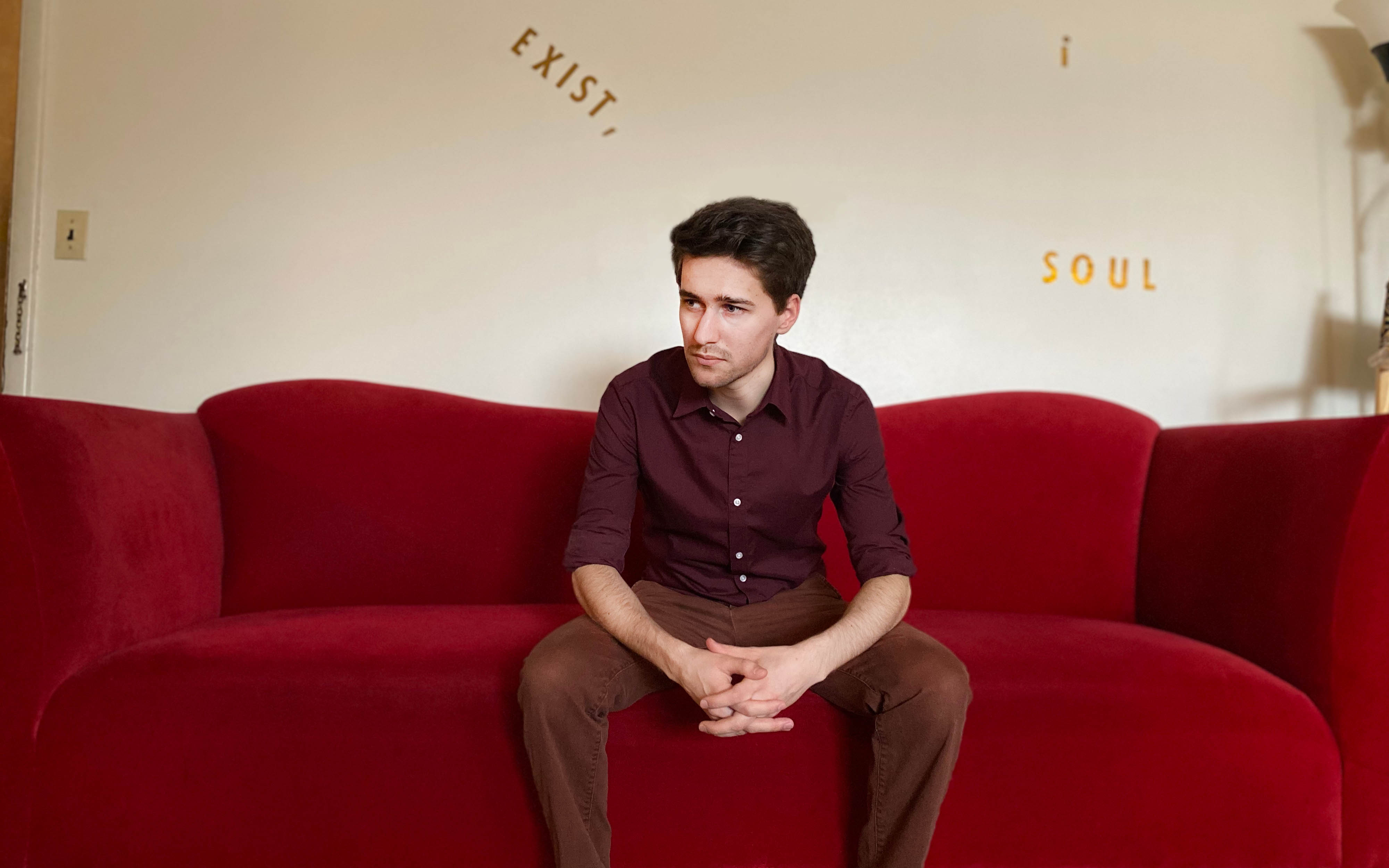 Stephen Karukas existing on a couch